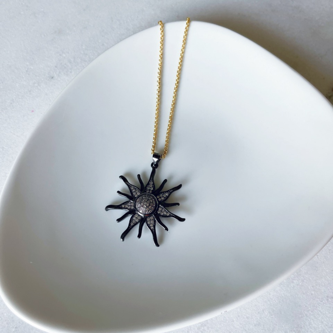 Black sun necklace