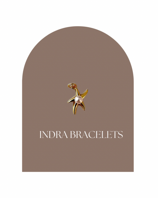 Golden starfish charm